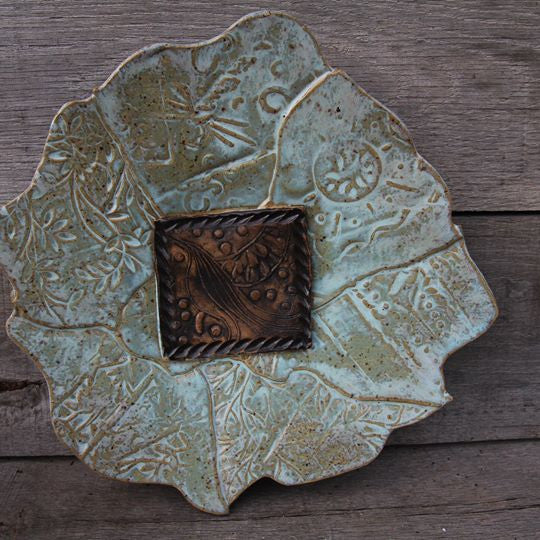 Patchwork stoneware plate with handmade bird stamp design